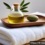 Home 22 천연비누 효능이 검증된 제품 - A serene bathroom scene showcasing a rustic wooden soap dish holding a handcrafted natural olive oil...